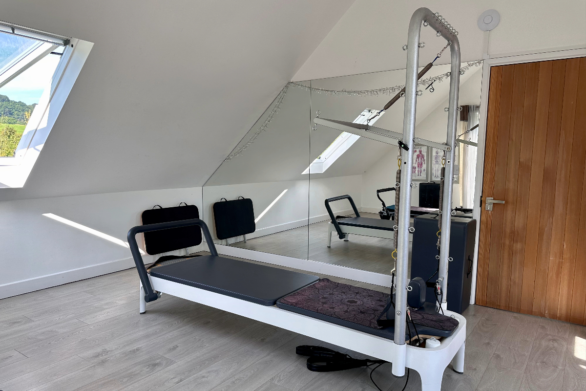 Pilates Reformer in Retreat Pilates studio with tower